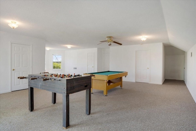 playroom with a textured ceiling, pool table, a ceiling fan, and light carpet