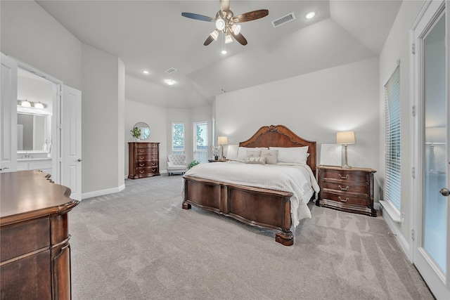 carpeted bedroom with a sink, baseboards, visible vents, recessed lighting, and a ceiling fan