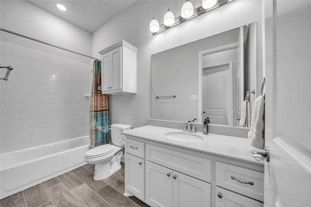 full bath featuring recessed lighting, shower / tub combo with curtain, toilet, and vanity