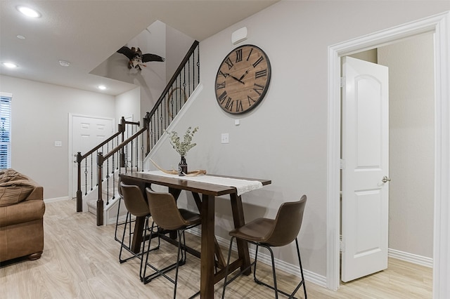 2728 Baneberry Ln, Mesquite, TX 75150 - dining area featuring light wood-style flooring, stairs, baseboards, and recessed lighting