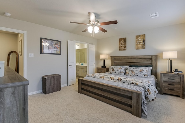 2728 Baneberry Ln, Mesquite, TX 75150 - carpeted bedroom with baseboards, ensuite bathroom, and a ceiling fan