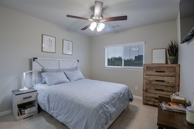 2728 Baneberry Ln, Mesquite, TX 75150 - bedroom featuring light carpet, baseboards, and a ceiling fan