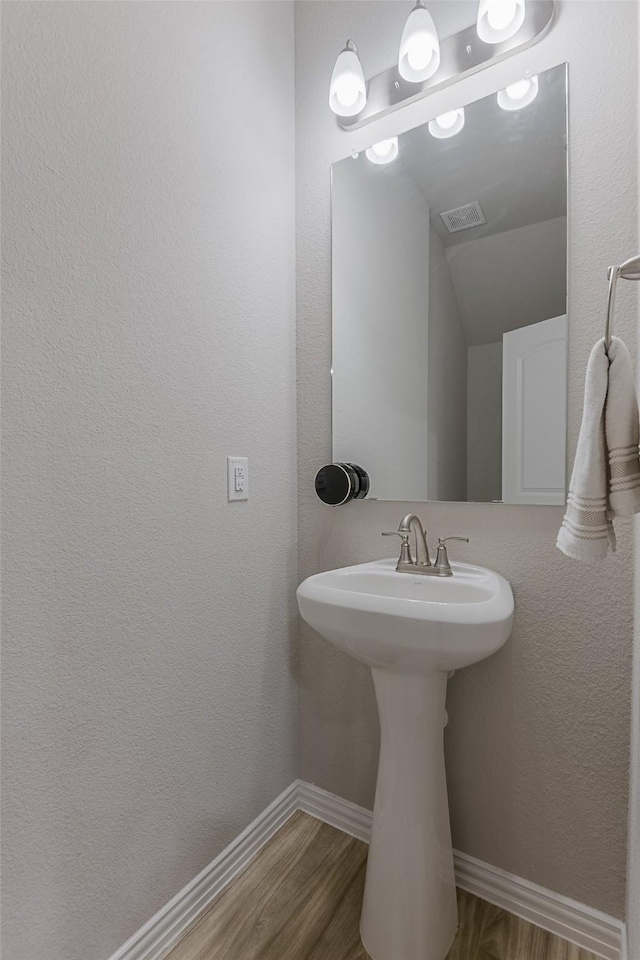 2728 Baneberry Ln, Mesquite, TX 75150 - bathroom with wood finished floors