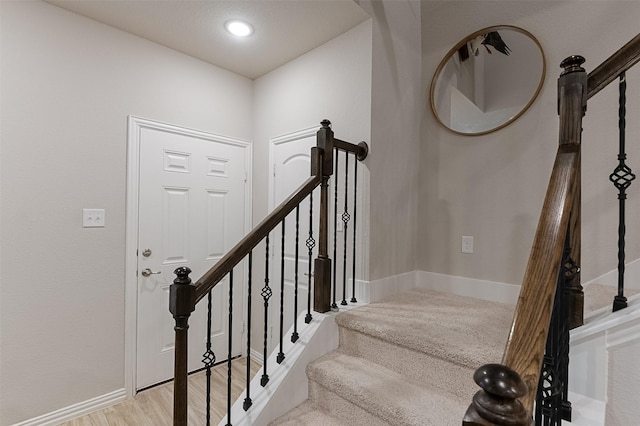 2728 Baneberry Ln, Mesquite, TX 75150 - stairs featuring baseboards, wood finished floors, and recessed lighting