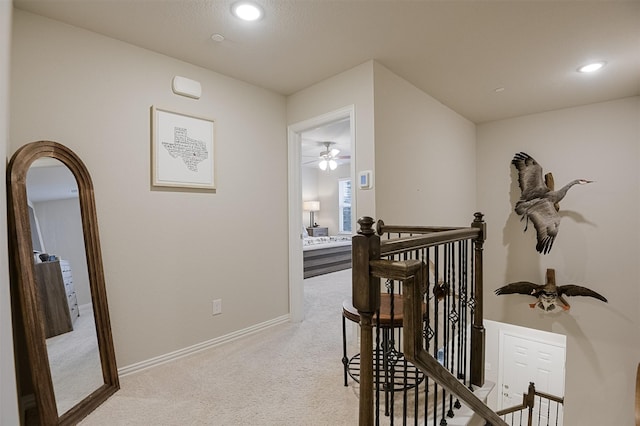 2728 Baneberry Ln, Mesquite, TX 75150 - hall with an upstairs landing, carpet, baseboards, and recessed lighting