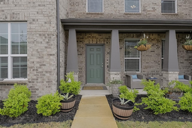 2728 Baneberry Ln, Mesquite, TX 75150 - doorway to property with covered porch and brick siding