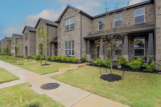 2728 Baneberry Ln, Mesquite, TX 75150 - view of front of house with a front yard and brick siding