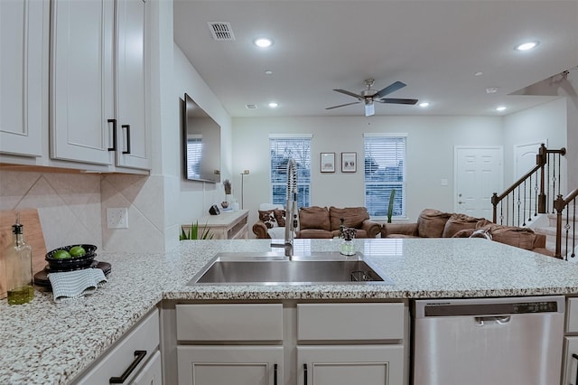 2728 Baneberry Ln, Mesquite, TX 75150 - kitchen featuring dishwasher, open floor plan, a ceiling fan, tasteful backsplash, and a sink