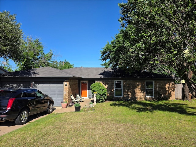 ranch-style house with a front lawn, brick siding, and a garage