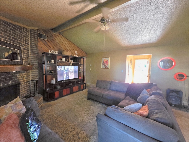 living area with a ceiling fan, visible vents, a brick fireplace, lofted ceiling with beams, and carpet floors