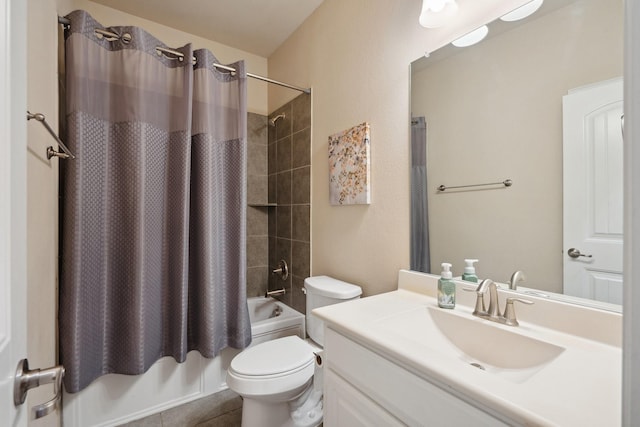 full bath with toilet, shower / tub combo, vanity, and tile patterned flooring