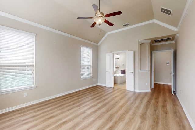 unfurnished bedroom with multiple windows and visible vents