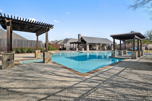 community pool featuring a patio area, fence, and a pergola