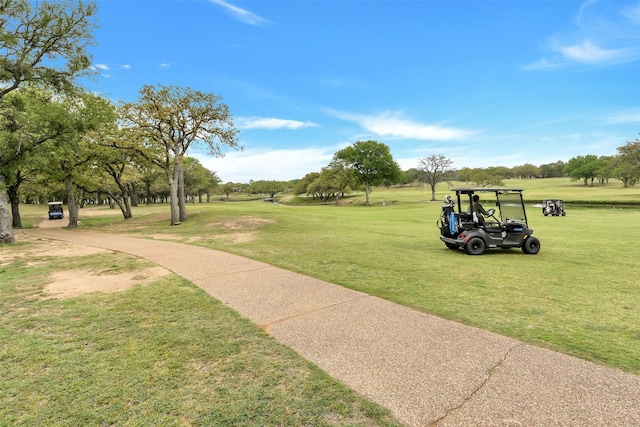 surrounding community with a yard