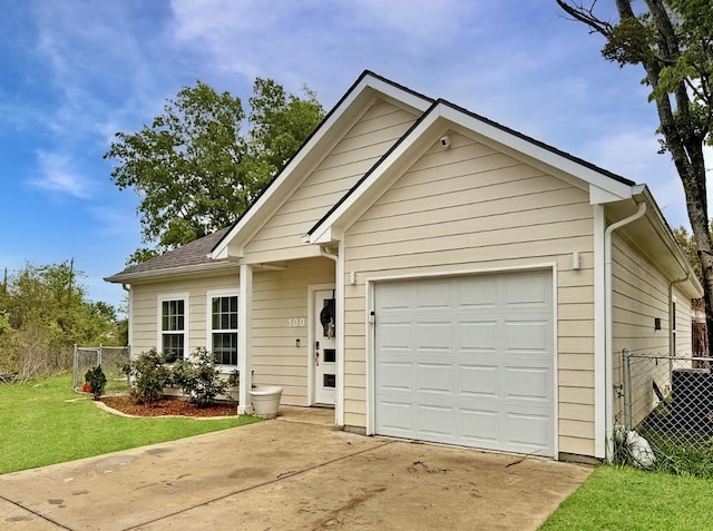 100 Winchester Cir, Gun Barrel City, TX 75156 - ranch-style house featuring a garage, fence, concrete driveway, and a front yard