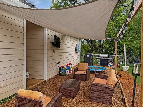 100 Winchester Cir, Gun Barrel City, TX 75156 - view of patio featuring grilling area and fence