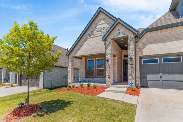 3432 Loftwood Ln, Anna, TX 75409 - french country home with concrete driveway, a garage, brick siding, and a front lawn