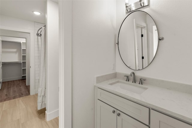 full bath with vanity and a shower with curtain