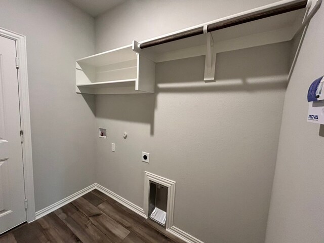 washroom featuring laundry area, dark wood-style flooring, hookup for an electric dryer, washer hookup, and hookup for a gas dryer