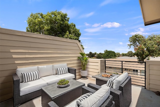 4914 Live Oak St Unit 7, Dallas, TX 75206 - view of patio with an outdoor living space with a fire pit