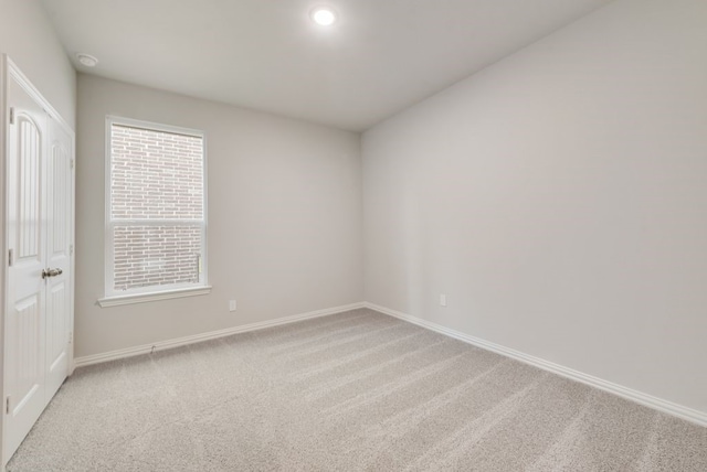 3523 Columbus St, Gainesville, TX 76240 - empty room with light colored carpet and baseboards