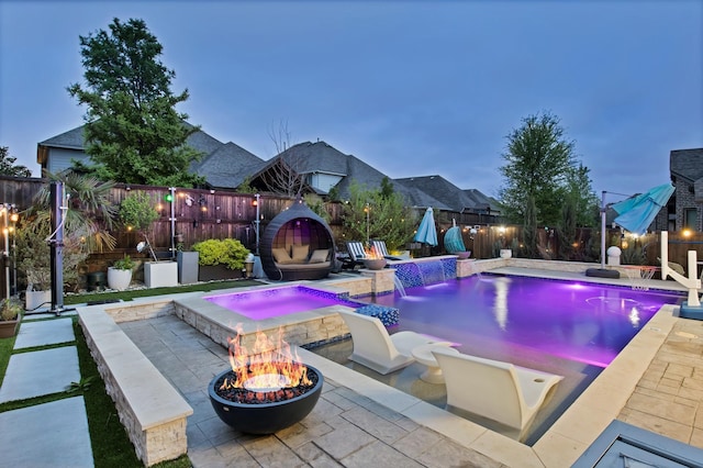 2400 Triton Dr, Mckinney, TX 75071 - view of pool with a fenced backyard, an outdoor fire pit, an in ground hot tub, and a patio