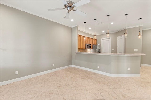 kitchen featuring crown molding, baseboards, a ceiling fan, appliances with stainless steel finishes, and decorative light fixtures