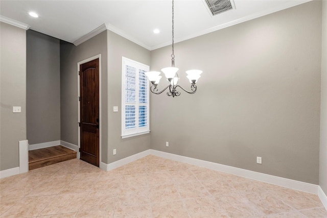 empty room featuring baseboards, visible vents, and ornamental molding