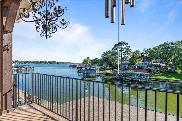 balcony featuring a water view