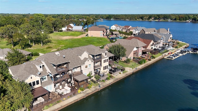 bird's eye view with a water view and a residential view