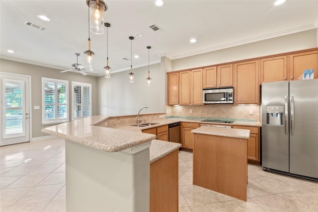 kitchen featuring ornamental molding, stainless steel appliances, backsplash, a sink, and visible vents