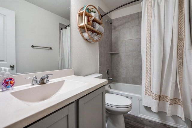 799 Bayberry Ln, Princeton, TX 75407 - full bath with vanity, shower / bath combo, toilet, and wood finished floors