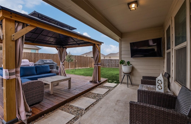 799 Bayberry Ln, Princeton, TX 75407 - view of patio with a gazebo, a wooden deck, a fenced backyard, an outdoor living space, and a grill