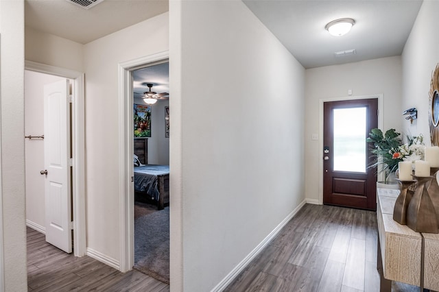 799 Bayberry Ln, Princeton, TX 75407 - interior space featuring baseboards, dark wood finished floors, and visible vents