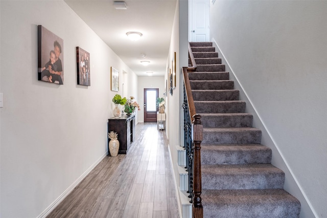 799 Bayberry Ln, Princeton, TX 75407 - staircase featuring baseboards and wood finished floors