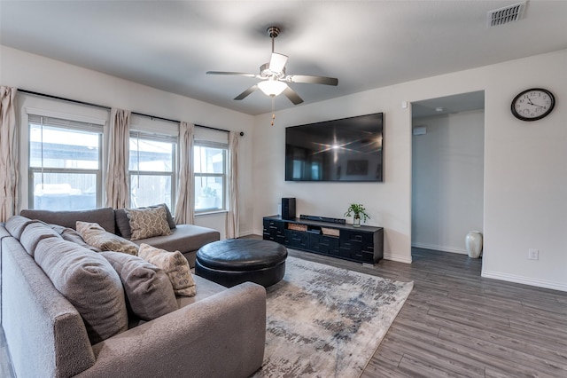 799 Bayberry Ln, Princeton, TX 75407 - living room featuring baseboards, ceiling fan, wood finished floors, and visible vents