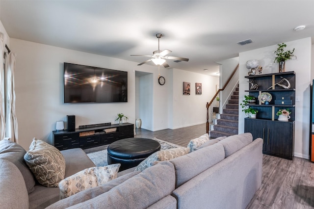 799 Bayberry Ln, Princeton, TX 75407 - living room with stairway, ceiling fan, wood finished floors, and visible vents