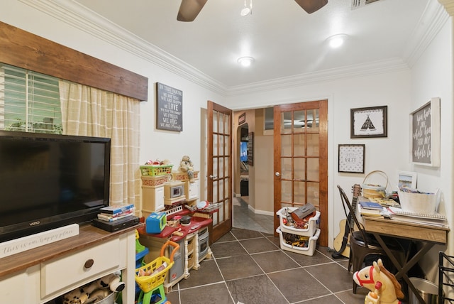 office area featuring ornamental molding, dark tile patterned floors, french doors, and ceiling fan