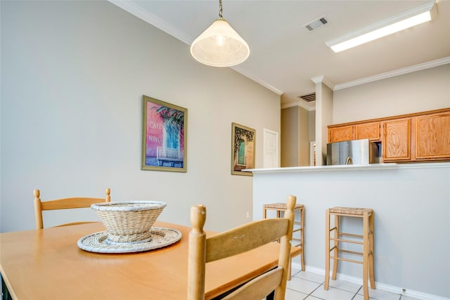 775 Marble Canyon Cir, Irving, TX 75063 - dining area with light tile patterned floors, visible vents, and crown molding