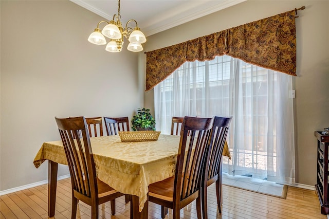 775 Marble Canyon Cir, Irving, TX 75063 - dining area with ornamental molding, a notable chandelier, plenty of natural light, and light wood-style floors