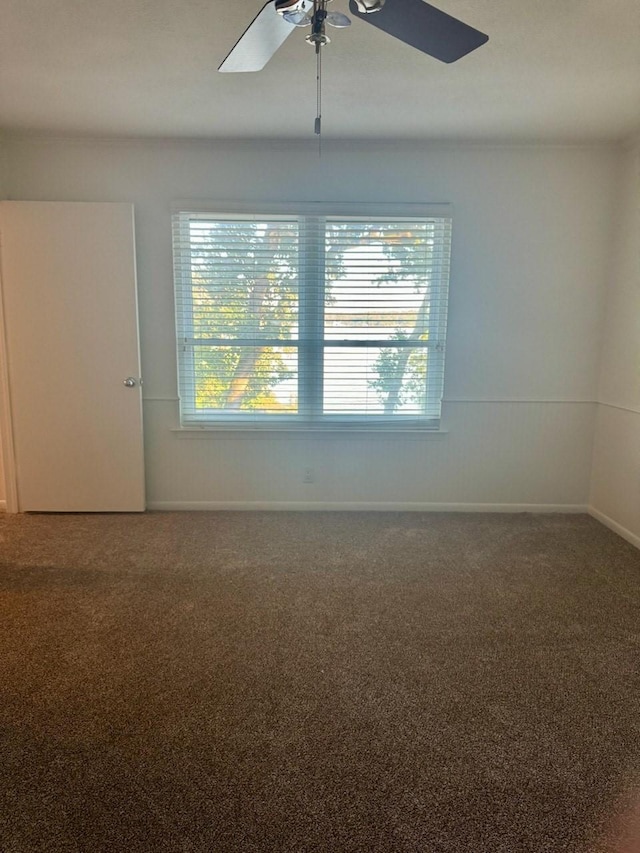 316 Oak Ln, Tool, TX 75143 - carpeted spare room with a ceiling fan