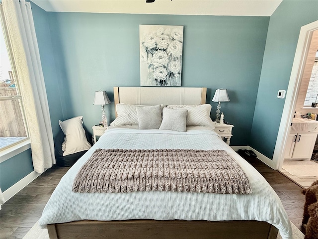 2312 Camp St, Aubrey, TX 76227 - bedroom featuring baseboards and wood finished floors
