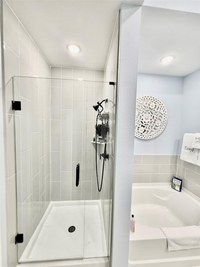 2312 Camp St, Aubrey, TX 76227 - full bathroom with a bath and a shower stall