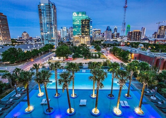 view of pool featuring a city view