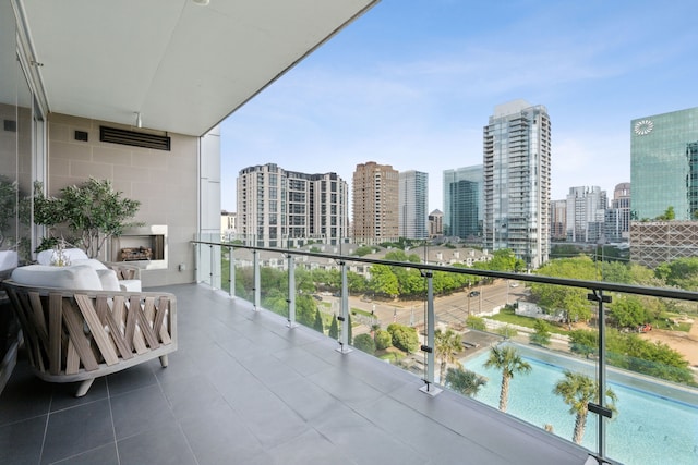 balcony featuring a city view