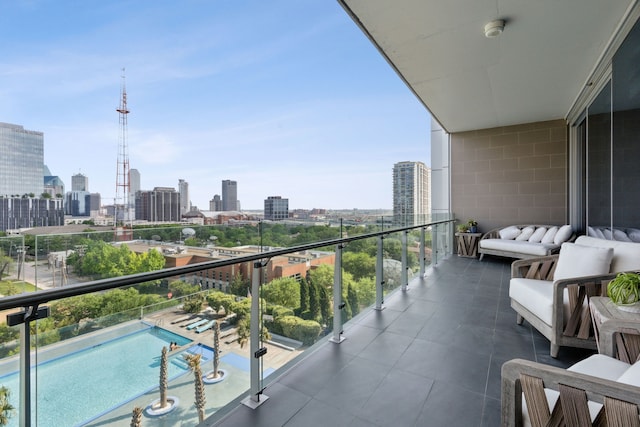 balcony featuring a view of city