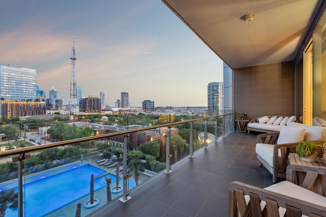balcony featuring a view of city