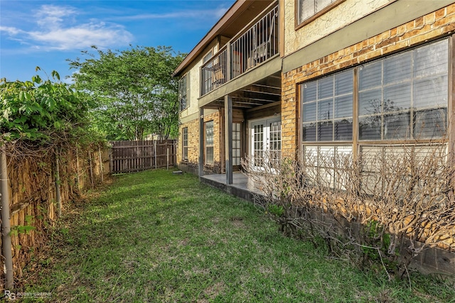 3100 Fairfield Ave Unit 8B, Shreveport, LA 71104 - view of yard featuring a balcony and a patio area