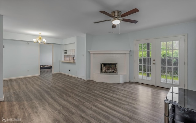3100 Fairfield Ave Unit 8B, Shreveport, LA 71104 - unfurnished living room with wood finished floors, a chandelier, french doors, and baseboards