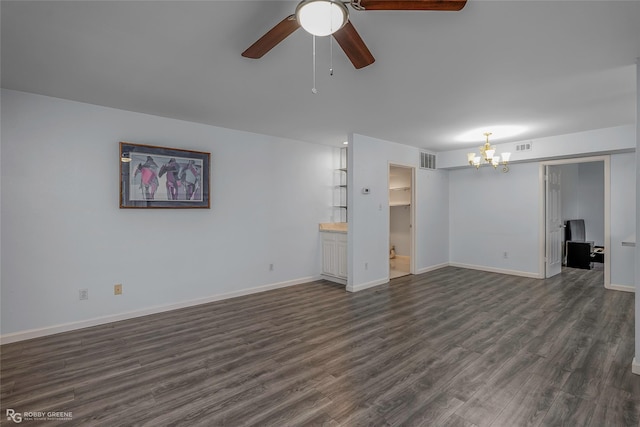 3100 Fairfield Ave Unit 8B, Shreveport, LA 71104 - unfurnished living room with a chandelier, a ceiling fan, dark wood finished floors, and baseboards